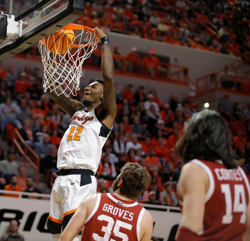 Oklahoma State Cowboys forward Kalib Boone (22) dunks the ball during a men's Bedlam college basketball game between the Oklahoma State University Cowboys (OSU) and the University of Oklahoma Sooners (OU) at Gallagher-Iba Arena in Stillwater, Okla., Wednesday, Jan. 18, 2023. 
