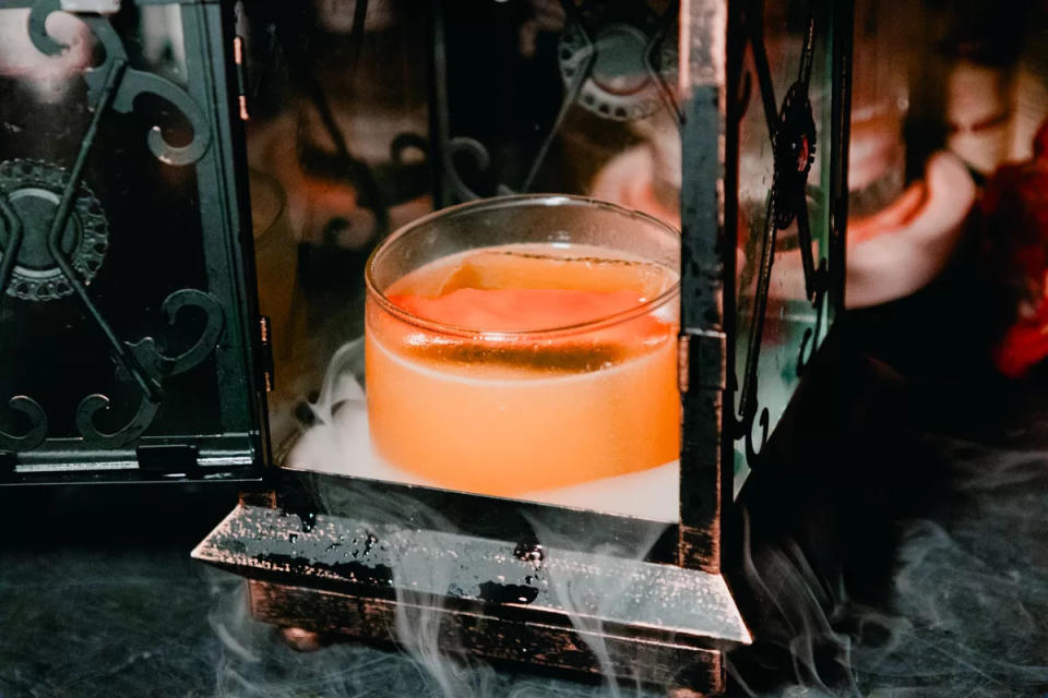 Taylor Adams -orange cocktail with smoke