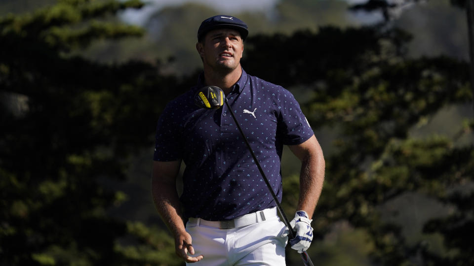 Bryson DeChambeau watches his tee shot on the 14th hole during the first round of the PGA Championship golf tournament at TPC Harding Park Thursday, Aug. 6, 2020, in San Francisco. (AP Photo/Jeff Chiu)