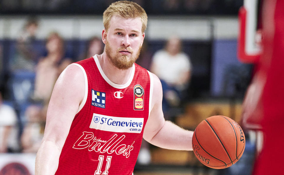 Harry Froling, pictured here in action for the Brisbane Bullets against the Illawarra Hawks.