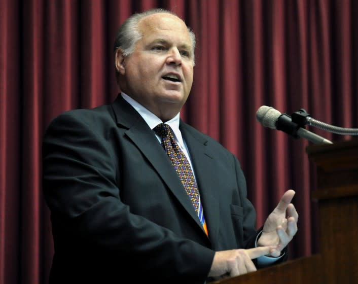 FILE - This May 14, 2012 file photo shows radio host Rush Limbaugh speaking during a ceremony inducting him into the Hall of Famous Missourians in the state Capitol in Jefferson City, Mo. Limbaugh says he's been diagnosed with advanced lung cancer. Addressing listeners on his program Monday, Feb. 3, 2020, he said he will take some days off for further medical tests and to determine treatment. (AP Photo/Julie Smith, File)