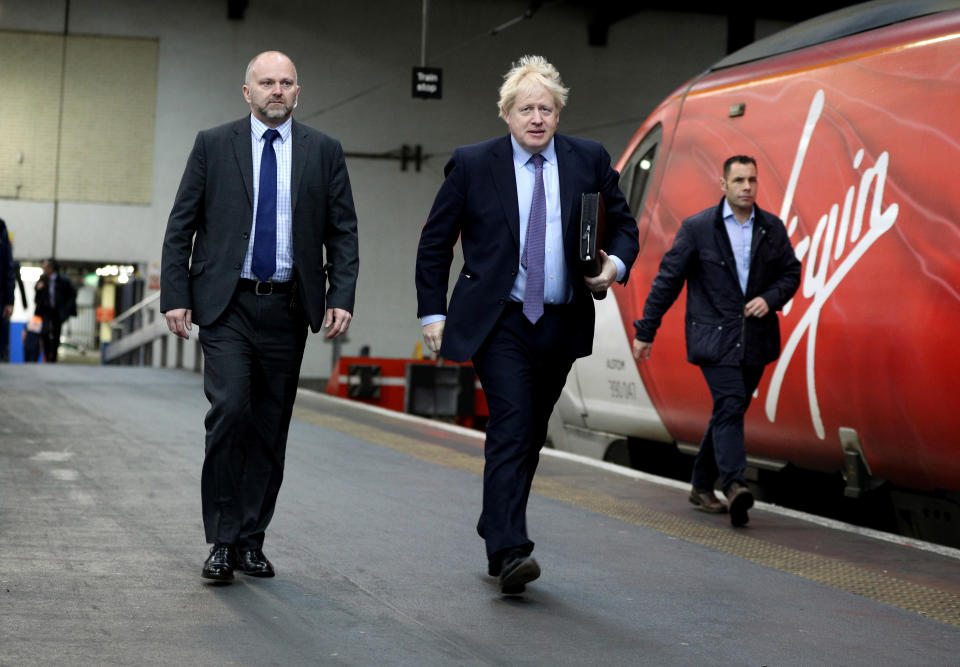 Britain's Prime Minister Boris Johnson arrives at Euston Station 