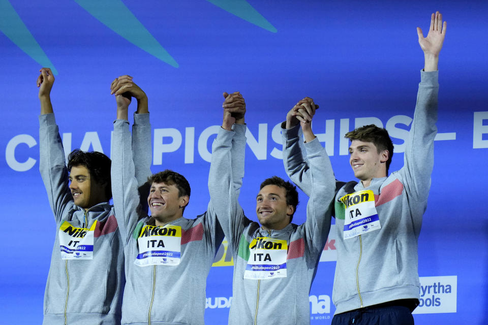 Team of Italy celebrates after winning the men's 4x100m medley relay at the 19th FINA World Championships in Budapest, Hungary, Saturday, June 25, 2022. (AP Photo/Petr David Josek)