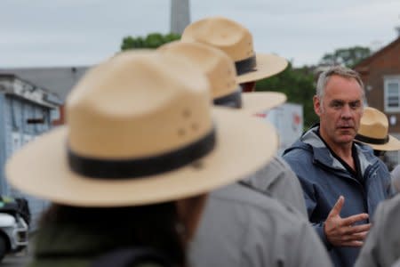 U.S. Interior Secretary Ryan Zinke (C) talks to National Park Service Rangers, while traveling for his National Monuments Review process, in Boston, Massachusetts, U.S., June 16, 2017.  Picture taken June 16, 2017.   REUTERS/Brian Snyder
