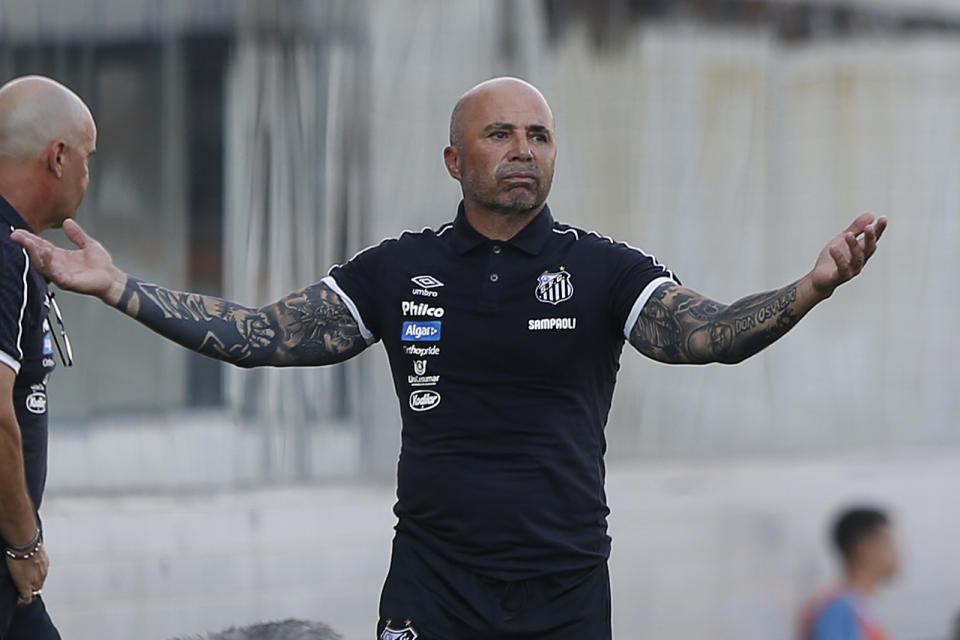 Jorge Sampaoli, coach of Santos, reacts during a Sao Paulo Soccer league championship match against Ferroviaria in Santos, Brazil, Saturday, Jan. 19, 2019. It's the first match of the coach Sampaoli, of Argentina, as head of the legendary Santos Soccer team. (AP Photo/Nelson Antoine)