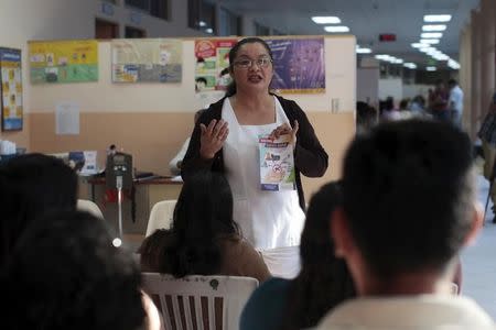 Patients participate in a Zika prevention talk as they wait to be attended to at the Women's National Hospital in San Salvador, El Salvador January 29, 2016. REUTERS/Jose Cabezas