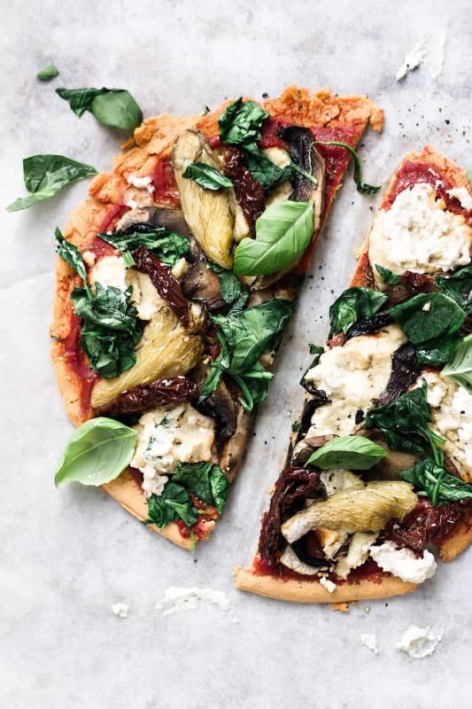 <p>Cup of Kale</p><p>Vegan, healthy, low-carb lentil crust pizza. A four-ingredient, quick weeknight dinner that's ready in 25 minutes. Just add your toppings, and make it your own!</p><p><strong>Get the recipe: <a href="https://cupfulofkale.com/lentil-crust-pizza/" rel="nofollow noopener" target="_blank" data-ylk="slk:Lentil Crust Pizza;elm:context_link;itc:0;sec:content-canvas" class="link ">Lentil Crust Pizza</a></strong></p>