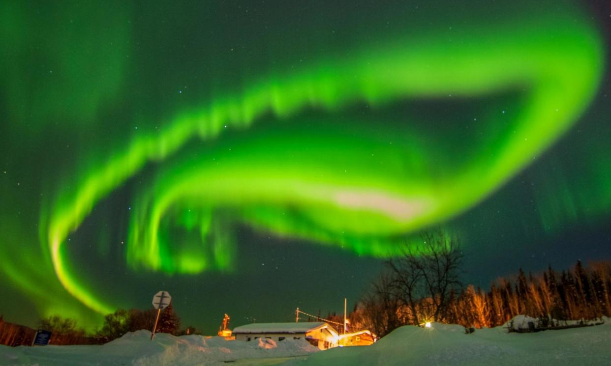 <span>The aurora borealis – better known as the northern lights – over the sky in Fairbanks, Alaska, in 2021.</span><span>Photograph: Luke Culver/Reuters</span>