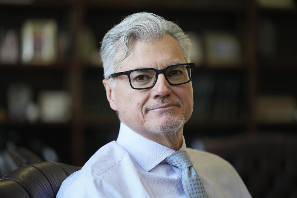 Judge Juan Merchan poses for a picture in his chambers in New York, Thursday, March 14, 2024. Merchan could become the first judge ever to oversee a former U.S. president’s criminal trial. He's presiding over Donald Trump’s hush money case in New York. (AP Photo/Seth Wenig)