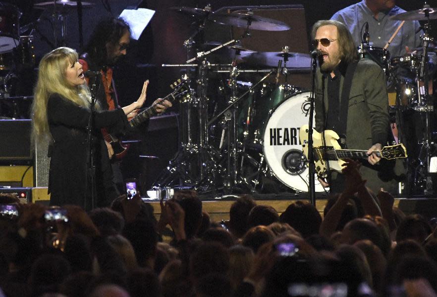 Stevie Nicks, left, and honoree Tom Petty perform "Stop Draggin' My Heart Around" at the MusiCares Person of the Year tribute at the Los Angeles Convention Center on Friday, Feb. 10, 2017. (Photo by Chris Pizzello/Invision/AP)