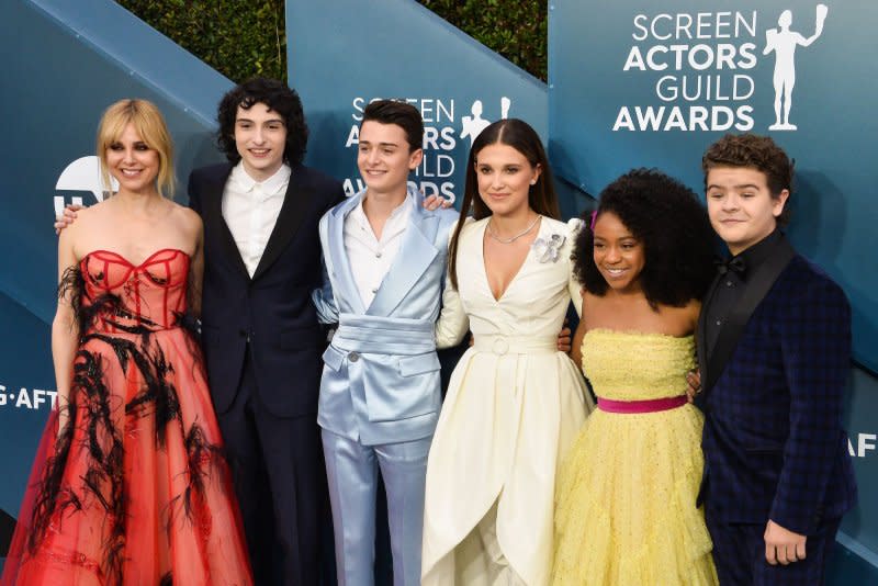 From left to right, Cara Buono, Finn Wolfhard, Noah Schnapp, Millie Bobby Brown, Priah Ferguson and Gaten Matarazzo of "Stranger Things," arrive for the SAG Awards in 2020. File Photo by Jim Ruymen/UPI