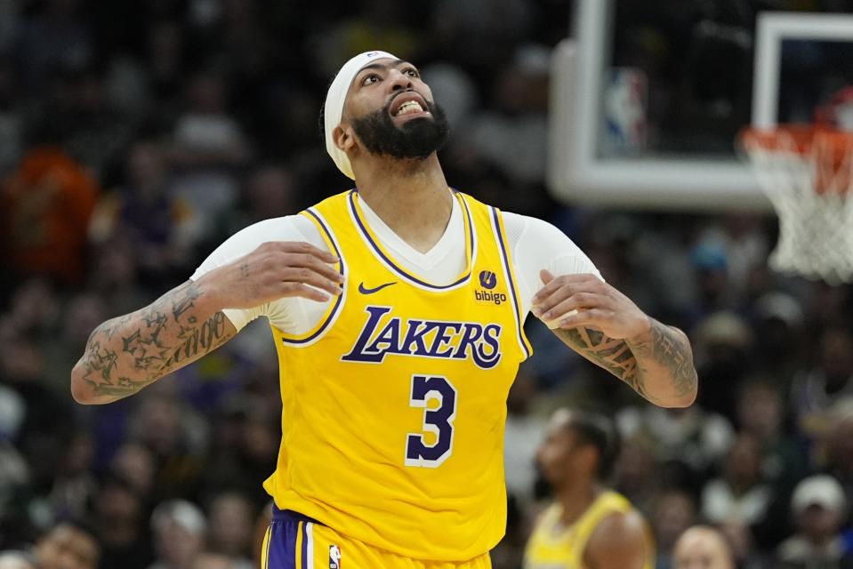 Los Angeles Lakers' Anthony Davis reacts during the second half of an NBA basketball game against the Milwaukee Bucks Tuesday, March 26, 2024, in Milwaukee. The Lakers won 128-124 in double overtime. (AP Photo/Morry Gash)