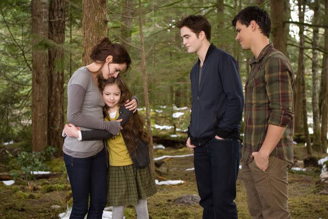 <p>Andrew Cooper/Summit</p> Kristen Stewart, Mackenzie Foy, Robert Pattinson and Taylor Lautner in <em>The Twilight Saga: Breaking Dawn – Part 2</em> (2012)