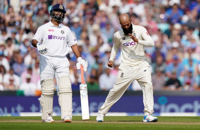 England’s Moeen Ali celebrates taking the wicket of India’s Virat Kohli 