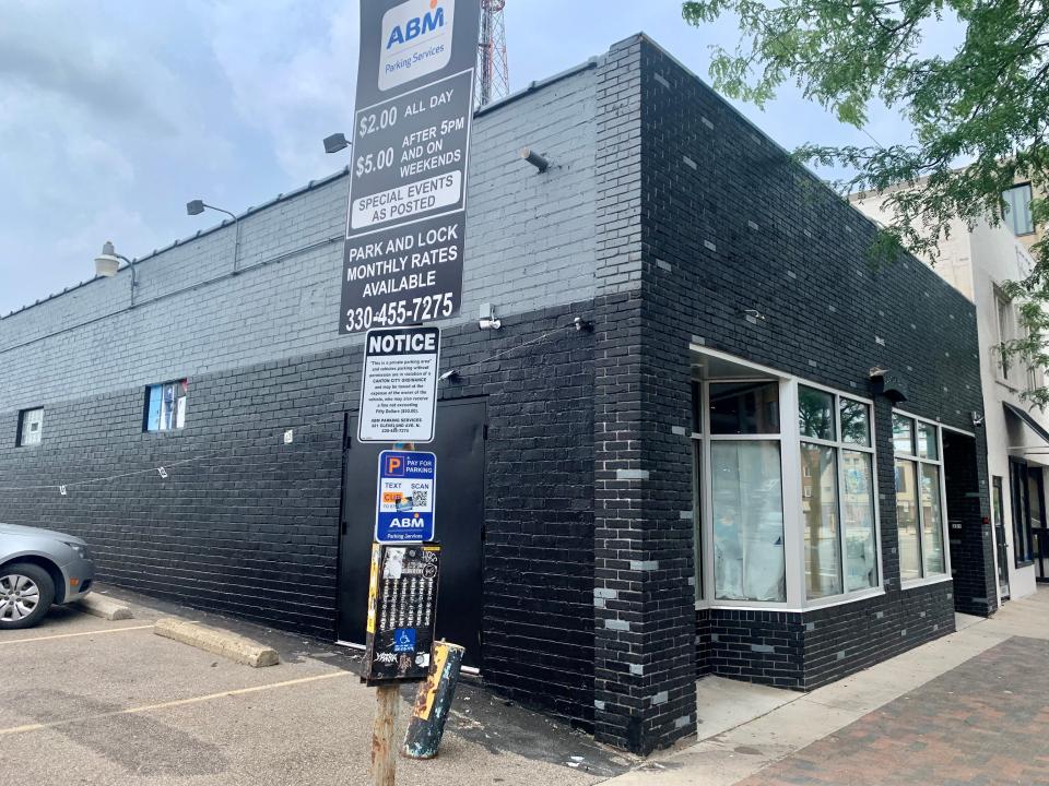 A postcard-style mural that said "Greetings from Canton, Ohio," was recently removed from the side of the former Buzzbin building at 331 Cleveland Avenue NW.