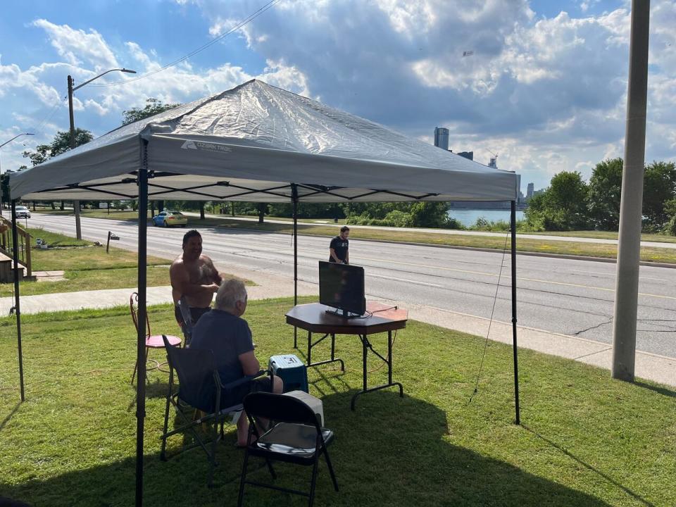 Steven Ippoliti has a TV set up while staking out a spot to watch Monday night's For Fireworks, as the Oilers take on the Panthers in Game 7 of the Stanley Cup final. 