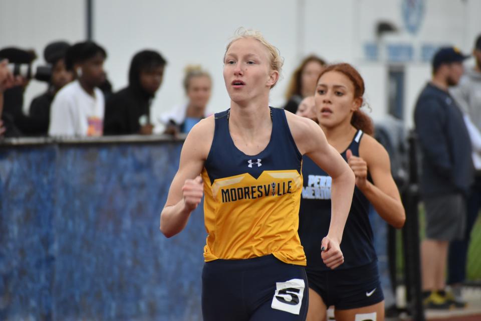 Mooresville's Alysha Bradford outpaces the pack in the 400-meter dash at the Mid-State Conference Track and Field championship on May 3, 2022. She placed first in the event.