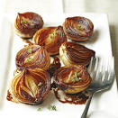 <p>As these onion halves cook, the balsamic mixture becomes syrupy and caramelizes the onions, giving them a bronzed caramel color and a luscious, rich flavor. <a href="https://www.eatingwell.com/recipe/264445/caramelized-balsamic-onions/" rel="nofollow noopener" target="_blank" data-ylk="slk:View Recipe;elm:context_link;itc:0;sec:content-canvas" class="link ">View Recipe</a></p>