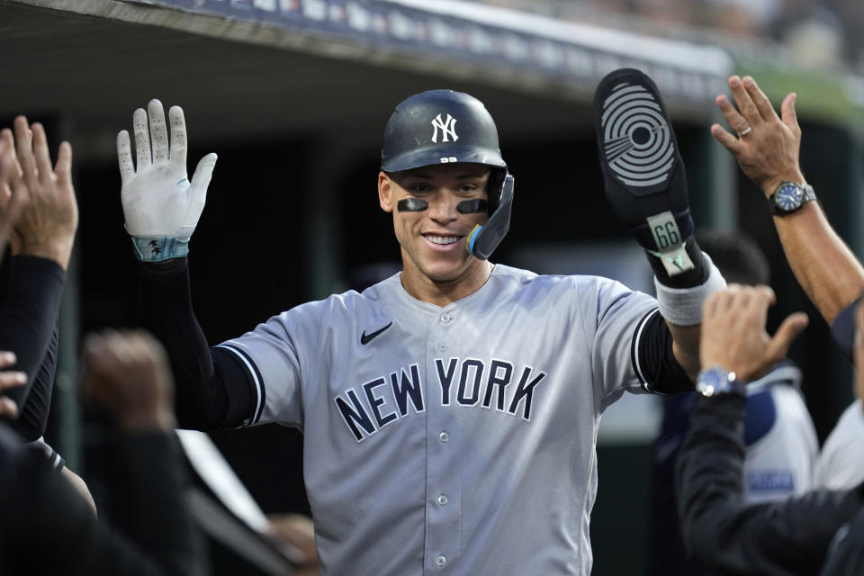 New York Yankees' Aaron Judge celebrates scoring on a Detroit Tigers passed ball in the sixth inning of a baseball game, Tuesday, Aug. 29, 2023, in Detroit. (AP Photo/Paul Sancya)