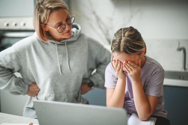 mother and daughter doing homework