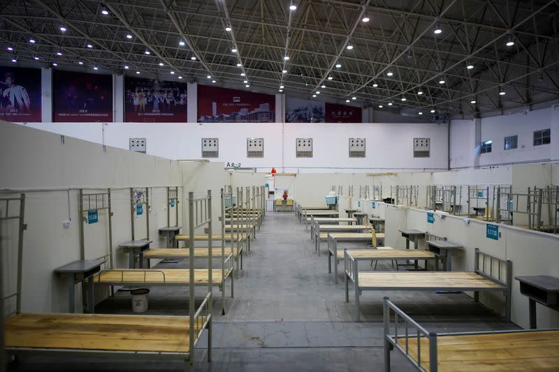 Bedframes are seen inside a convention center that was used as a makeshift hospital in Wuhan