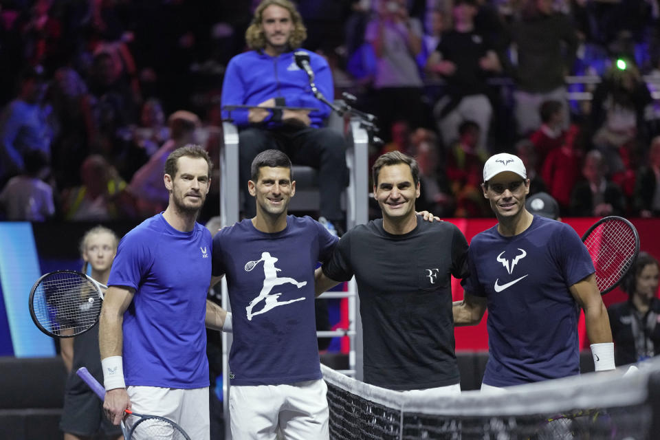 FILE - From left, Britain's Andy Murray, Serbia's Novak Djokovic, Switzerland's Roger Federer and Spain's Rafael Nadal attend a training session ahead of the Laver Cup tennis tournament at O2 in London, Thursday, Sept. 22, 2022. Who was the last player other than Roger Federer, Novak Djokovic, Rafael Nadal or Andy Murray to win the men's singles championship at Wimbledon? (AP Photo/Kin Cheung, File)