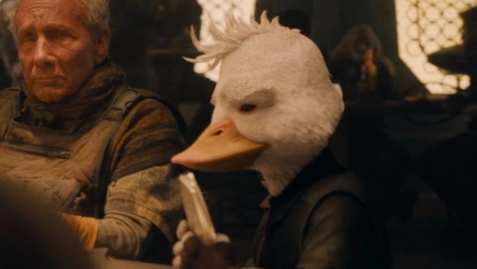 Howard the Duck playing cards  in yellow light in in Guardians of the Galaxy Vol. 3
