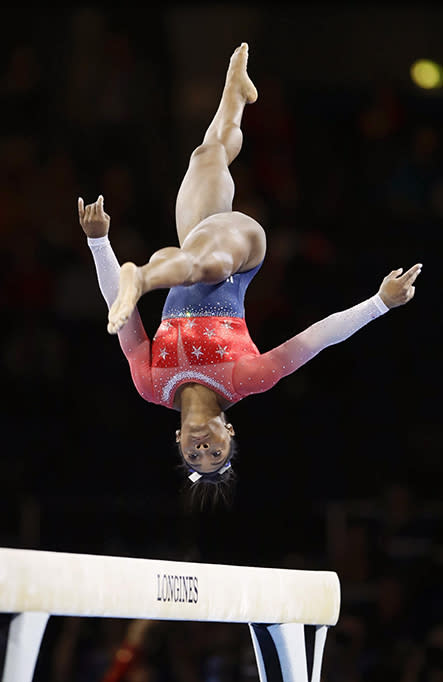 <p>Simone Biles performs on the balance beam in the women’s team final at the artistic gymnastics world championships in Stuttgart, Germany on Oct. 8, 2019.</p>