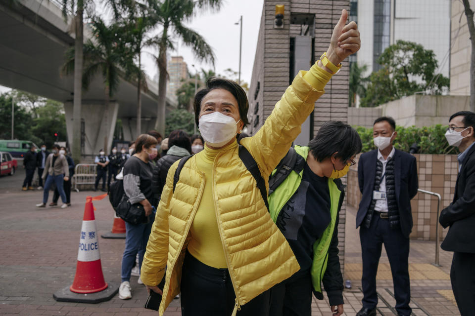 Pro-democracy activist Emily Lau Wai-hing gestures as she arrives at the West Kowloon Magistrates' Courts in Hong Kong, Monday, Feb. 6, 2023. Some of Hong Kong's best-known pro-democracy activists went on trial Monday in the biggest prosecution yet under a law imposed by China's ruling Communist Party to crush dissent. (AP Photo/Anthony Kwan)