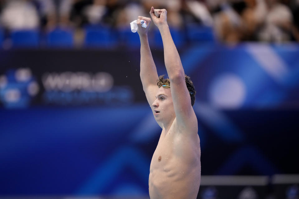 Leon Marchand of France celebrates after winning the men's 200m individual medley final at the World Swimming Championships in Fukuoka, Japan, Thursday, July 27, 2023. (AP Photo/Eugene Hoshiko)