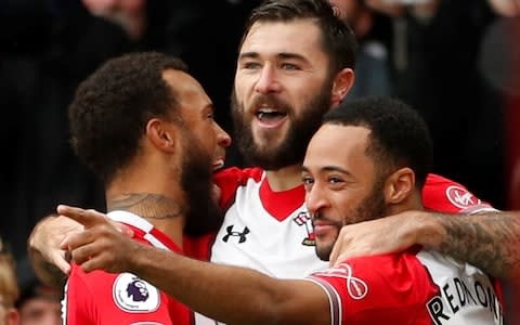 Charlie Austin celebrates scoring their first goal with Nathan Redmond (R) and Ryan Bertrand (L) - Credit: Action Images via Reuters/John Sibley 