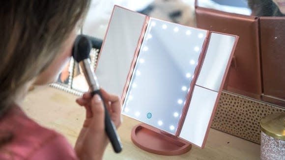 Best gifts for makeup lovers: Glamcor Riki Skinny and DeWeisn Tri-Fold Lighted Mirror