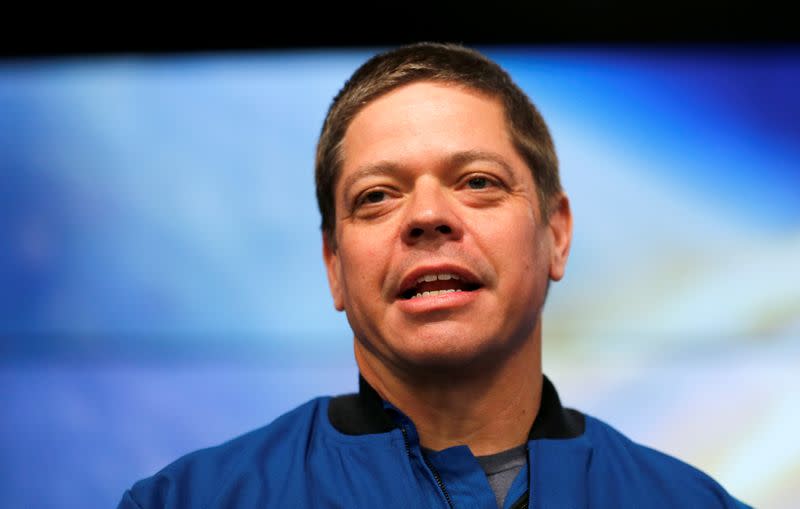 NASA astronaut Bob Behnken speaks at a news conference