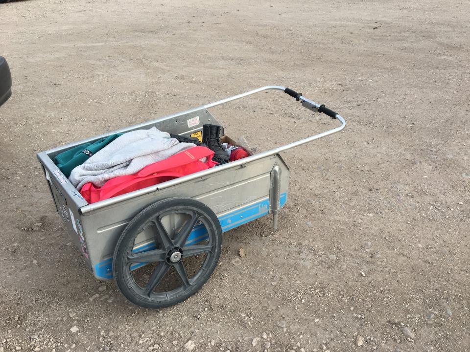 A wheelbarrow to carry belongings.