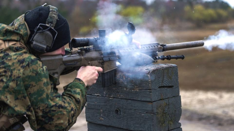A Marine fires a 7.62x51mm M110 rifle during training.<em> USMC</em>