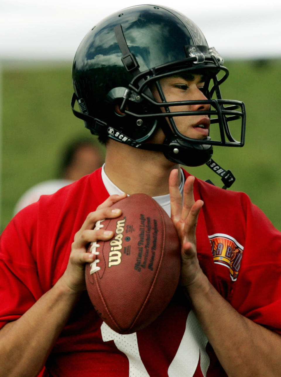 West team quarterback Timmy Chang of Hawaii is shown during practice for the Hula Bowl Thursday, Jan. 20, 2005, in Wailuku on the island of Maui in Hawaii. Teams of college standouts from East and West meet in the Hula Bowl Saturday, Jan. 22. (AP Photo/Reed Saxon)