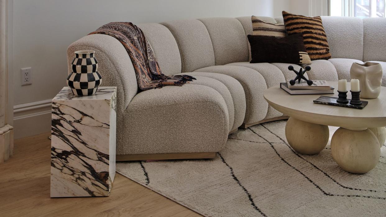 living room with boucle sofa