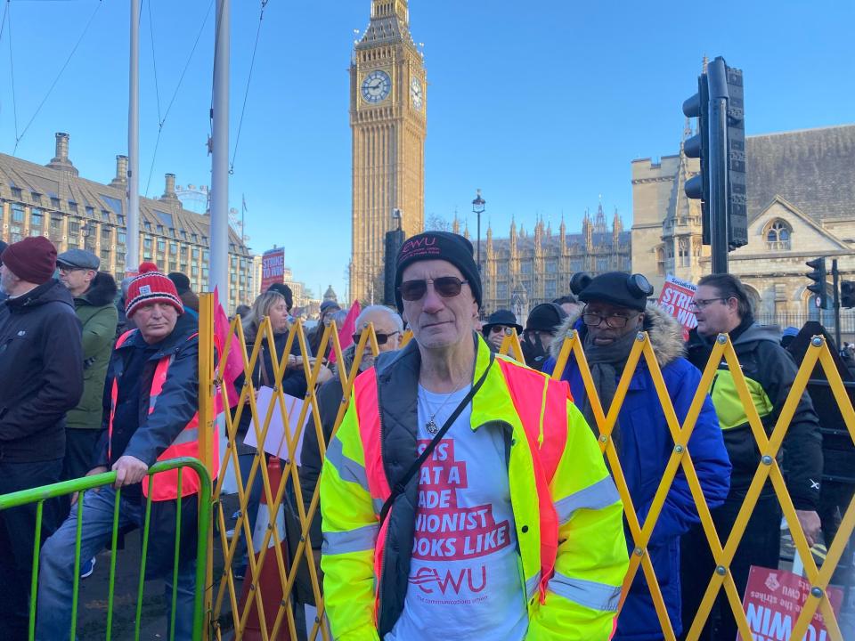 Royal Mail worker Gary Vipond (62) protests at Parliament Square rally (Mustafa Qadri/The Independent)