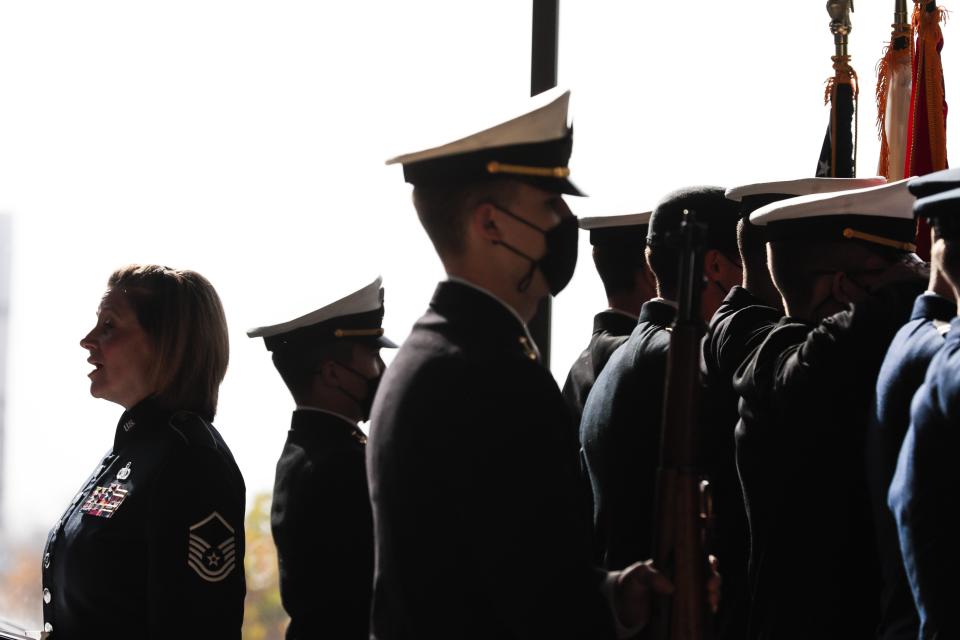 U.S. Air Force Master Sgt. Christin Foley sings the "Star-Spangled Banner" at the start of a Veterans Day ceremony in 2021 at the National Veterans Memorial and Museum in Columbus.