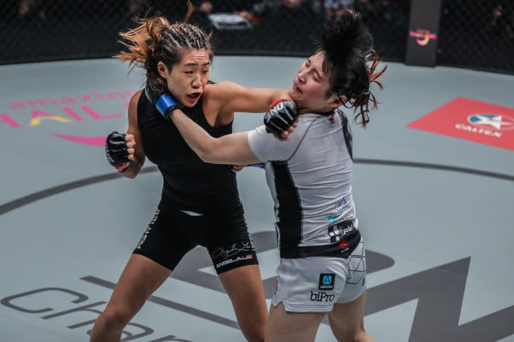 Angela Lee lands a punch on Jenny Huang during her submission win in March. (Credit: ONE Championship)