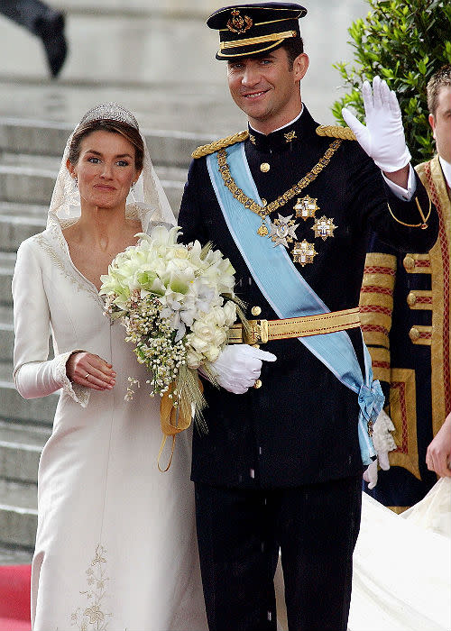 <b>4. Prince Felipe And Letizia Ortiz Rocasolano: </b><br>Spanish Crown Prince Felipe de Bourbon and his bride, princess Letizia Ortiz leave the Almudena cathedral after their wedding ceremony May 22, 2004 in Madrid.