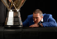 <p>Alex Ovechkin of the Washington Capitals looks at the Maurice “Rocket” Richard Trophy during the 2014 NHL Awards at the Encore Theater at Wynn Las Vegas on June 24, 2014 in Las Vegas, Nevada. (Photo by Harry How/Getty Images) </p>