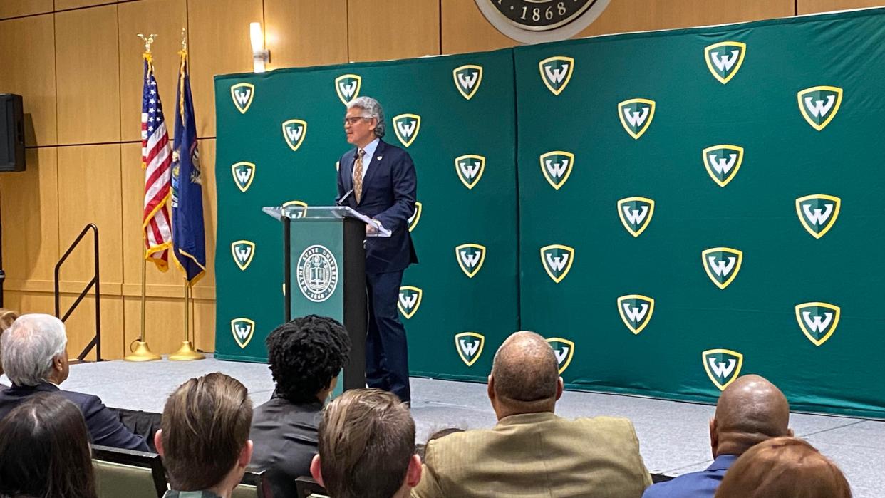 Wayne State University President Roy Wilson announces school will give free tuition to Michigan students whose families earns under $70,000 a year.