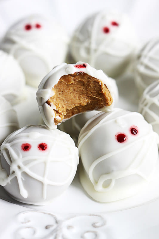 <p>Yes, mummy-style cheesecake truffles are extremely festive. What's more? They happen to be no bake, super easy, and totally delicious.</p><p><strong>Get the recipe:</strong> <a href="https://www.lecremedelacrumb.com/pumpkin-cheesecake-truffle-mummies-bake" rel="nofollow noopener" target="_blank" data-ylk="slk:Pumpkin Cheesecake Truffle Mummies;elm:context_link;itc:0;sec:content-canvas" class="link ">Pumpkin Cheesecake Truffle Mummies</a></p>
