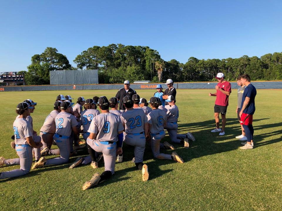 St. John Paul II Head coach Peter Graffeo addresses the Eagles after their 14-0 Class 3A regional playoff rout of Benjamin on May 8, 2024.