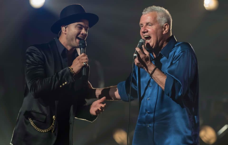 Daryl performing with Guy Sebastian. Source: Getty