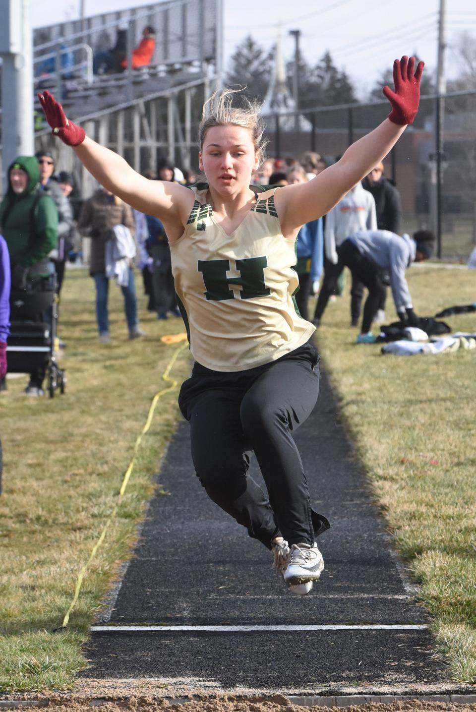 Howell's Sophie Daugard won long jump and shot put in the Lansing Catholic Relays.