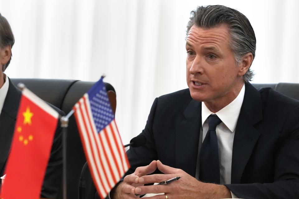 California Gov. Gavin Newsom meets with Zheng Shanjie, head of China's National Development and Reform Commission, unseen, in Beijing, Wednesday, Oct. 25, 2023. Newsom also met with China's senior most diplomat Wang Yi on Wednesday and displayed a brief moment of friendliness that stands in sharp contrast to the dialogue between the U.S. and China in recent years. (AP Photo/Ng Han Guan)