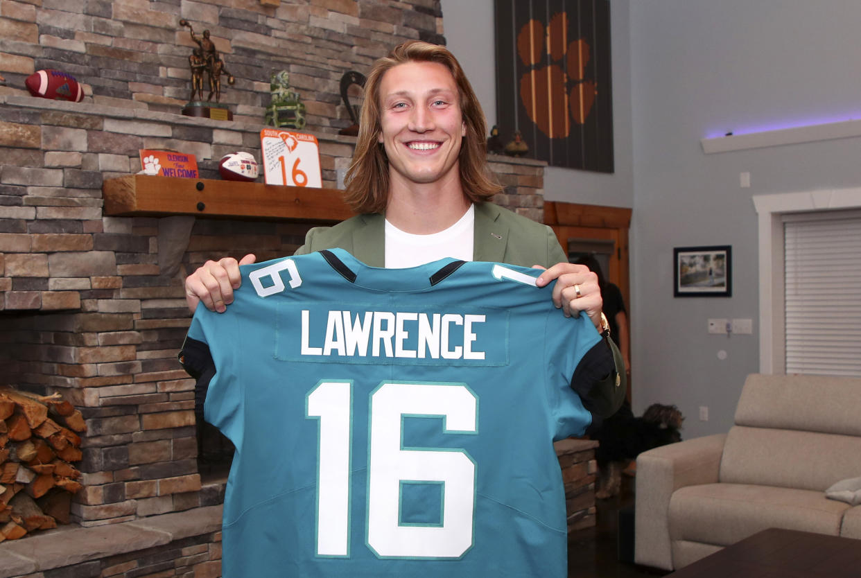 Five quarterbacks, including Clemson's Trevor Lawrence, were selected in the first 15 picks of the 2021 NFL draft. It may be surprising, but projects to be the new normal. (Photo by Logan Bowles/NFL via Getty Images)