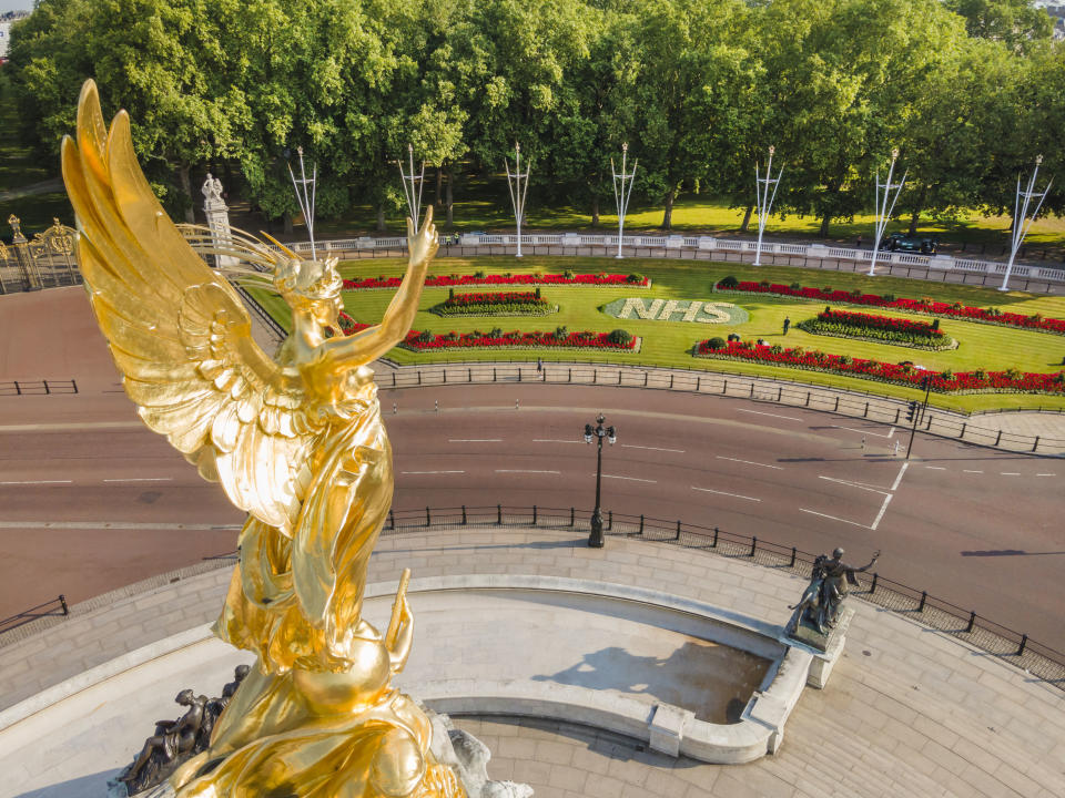 An aerial view of one of two specially created 12 x 5 metre flowerbeds in front of Buckingham Palace in the Memorial Gardens in St James's Park as a tribute to the 72nd anniversary of the NHS. The letters are made up of 1,500 Begonia semperflorens 'Heaven White' plants in each bed, while the background is 21,000 plants of Echeveria imbricate, Senecio serpens and Sedum pachyclados.